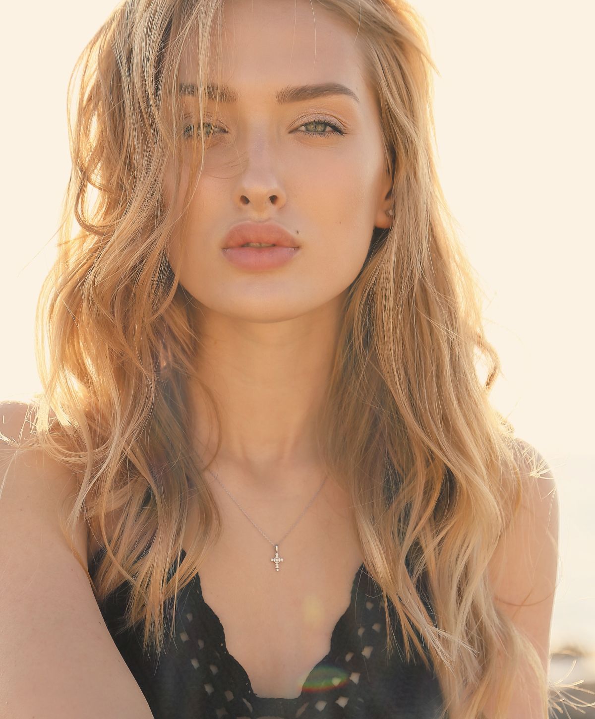 Close-up of a Dedham lip filler model's face with natural makeup.